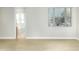 Bright bedroom with a large window and ensuite bathroom at 20802 N Grayhawk Dr # 1151, Scottsdale, AZ 85255