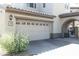 Attached two car garage, number 1151, providing convenient parking and curb appeal at 20802 N Grayhawk Dr # 1151, Scottsdale, AZ 85255