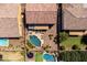 Backyard oasis featuring a sparkling pool, lush landscaping, and ample lounge space at 21030 E Misty Ln, Queen Creek, AZ 85142