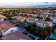 Aerial view showcases a backyard featuring a pool and ample space for outdoor activities and entertaining at 21030 E Misty Ln, Queen Creek, AZ 85142