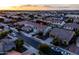 Panoramic aerial perspective of the property's setting in a suburban neighborhood at sunset at 21030 E Misty Ln, Queen Creek, AZ 85142