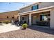 Expansive backyard featuring a covered patio with outdoor kitchen, ideal for relaxing and hosting gatherings at 21030 E Misty Ln, Queen Creek, AZ 85142