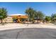 Community park with playground, picnic tables and sunshade canopies at 21030 E Misty Ln, Queen Creek, AZ 85142