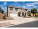 Beautiful home with a well-manicured lawn, a two-car garage, and a spacious driveway at 21030 E Misty Ln, Queen Creek, AZ 85142