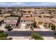 Charming two-story home boasts a well-manicured front yard and inviting curb appeal at 21030 E Misty Ln, Queen Creek, AZ 85142