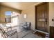 Inviting front porch with comfortable seating and a charming entrance to the home at 21030 E Misty Ln, Queen Creek, AZ 85142