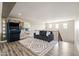 The upstairs loft features wood floors, an arcade game, and access to the bedrooms at 21030 E Misty Ln, Queen Creek, AZ 85142