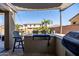 Outdoor kitchen area with a built-in grill, providing a great space for outdoor cooking and gatherings at 21030 E Misty Ln, Queen Creek, AZ 85142