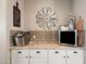 A butler's pantry offers stainless steel appliances, granite counters, and ample storage at 21030 E Misty Ln, Queen Creek, AZ 85142