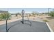 Community exercise equipment and rubberized pad providing fitness and recreation in landscaped area at 24090 W Sunland Ave, Buckeye, AZ 85326