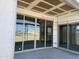 Covered patio showcases large sliding glass doors and open-air design ready for your personal touch at 24090 W Sunland Ave, Buckeye, AZ 85326
