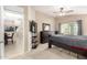 Spacious bedroom with neutral carpet, ceiling fan, and plenty of natural light at 2725 E Mine Creek Rd # 2186, Phoenix, AZ 85024