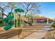 A brightly colored playground offers a fun space, complemented by a nearby picnic area for easy supervision at 2725 E Mine Creek Rd # 2186, Phoenix, AZ 85024