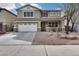 Beautiful two-story home featuring a two-car garage and low-maintenance desert landscaping at 29437 W Columbus Ave, Buckeye, AZ 85396