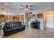 Spacious living room with tile floors, a wine rack, and open access to the kitchen at 29437 W Columbus Ave, Buckeye, AZ 85396
