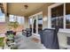 Covered patio with a barbecue grill, seating, plants and a view of the backyard at 29437 W Columbus Ave, Buckeye, AZ 85396