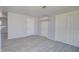 A dining room with gray walls, wood floors, chandelier, and doors at 3355 W Tollan Dr, Eloy, AZ 85131