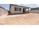 New construction home with graded backyard ready for landscaping at 338 E Las Perlas Ln, San Tan Valley, AZ 85140