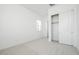 Bright bedroom with a window and closet at 338 E Las Perlas Ln, San Tan Valley, AZ 85140