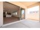 Covered patio with sliding doors leading to the interior at 338 E Las Perlas Ln, San Tan Valley, AZ 85140