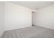 A cozy bedroom featuring neutral carpet and bright white walls, ready for personalization at 366 E Las Perlas Ln, San Tan Valley, AZ 85140
