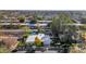 Aerial shot of a property with a pool, well-maintained landscaping, and neighborhood views at 37 Spur Cir, Scottsdale, AZ 85251