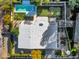 Aerial view of property showcasing pool, putting green, patio, landscaping, and rooftop at 37 Spur Cir, Scottsdale, AZ 85251