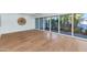 Bright living room featuring floor-to-ceiling windows and hardwood flooring at 37 Spur Cir, Scottsdale, AZ 85251