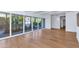 Spacious living room with large windows offering views of the landscaped backyard at 37 Spur Cir, Scottsdale, AZ 85251