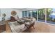 Modern living room featuring hardwood floors and expansive windows with bright natural light at 37 Spur Cir, Scottsdale, AZ 85251