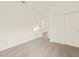 Bright bedroom featuring carpet flooring, sliding door closet, and neutral tones at 37098 W Prado St, Maricopa, AZ 85138