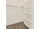 Walk-in closet with shelving and ample storage space at 37098 W Prado St, Maricopa, AZ 85138