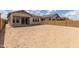 Large backyard area with ample space and block wall, perfect for outdoor activities at 3746 E Rochelle Cir, Mesa, AZ 85215