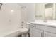 Clean bathroom featuring a tub-shower combination, white cabinets, and a neutral color palette at 3746 E Rochelle Cir, Mesa, AZ 85215