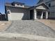 Charming single-story home showcasing a paved driveway leading to a two-car garage at 3746 E Rochelle Cir, Mesa, AZ 85215