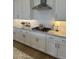 Elegant kitchen featuring granite countertops and white subway tile backsplash at 3746 E Rochelle Cir, Mesa, AZ 85215