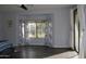 Spacious main bedroom with bay window, hardwood floors, and ensuite bathroom at 3957 N 148Th Dr, Goodyear, AZ 85395