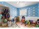 Playroom featuring a cloud-themed design with ample storage and natural light at 4031 N 81St Ave, Phoenix, AZ 85033