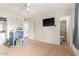 Bedroom offers tile floors, a ceiling fan, closet, and an en-suite bathroom at 4031 N 81St Ave, Phoenix, AZ 85033