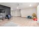 Open-concept living area with tile floors and ample space at 4031 N 81St Ave, Phoenix, AZ 85033