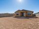 Large backyard, ready for landscaping and outdoor activities, complemented by the home's inviting exterior at 4154 W Jeanette Ln, San Tan Valley, AZ 85144