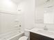 Bathroom featuring a bathtub, toilet, and a sink at 4154 W Jeanette Ln, San Tan Valley, AZ 85144