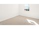 Bright bedroom with neutral carpet and a view outside at 4154 W Jeanette Ln, San Tan Valley, AZ 85144