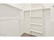 Walk in closet featuring open shelves and ample storage space at 4154 W Jeanette Ln, San Tan Valley, AZ 85144