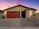 Charming single-story home boasts a brick driveway, a two-car garage, and low-maintenance desert landscaping at 4154 W Jeanette Ln, San Tan Valley, AZ 85144