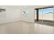 Bright living room featuring large windows and a sliding glass door at 4154 W Jeanette Ln, San Tan Valley, AZ 85144