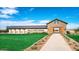 Beautiful entrance to Bella Vista Farms with manicured lawns and a stone building with the community name at 4293 E Brook Lynn Pl, San Tan Valley, AZ 85143