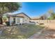 Well maintained backyard featuring a built-in fire pit and low maintenance landscaping at 4332 W Carson Rd, Laveen, AZ 85339