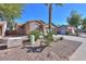 Inviting single-Gathering home featuring desert landscaping and an attached two-car garage at 43409 W Sagebrush Trl, Maricopa, AZ 85138