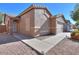 Charming single Gathering home, well manicured desert landscaping, and a spacious two-car garage at 43409 W Sagebrush Trl, Maricopa, AZ 85138